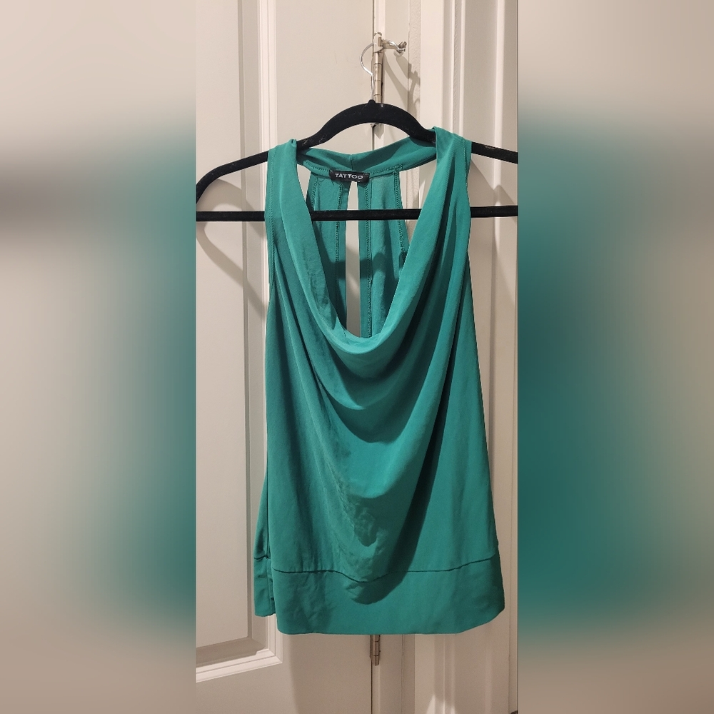 Flattering Green Low Neck Exposed Back Blouse